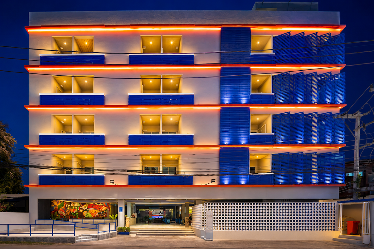AKIRA Hotel Pattaya at night with signature blue LED lighting